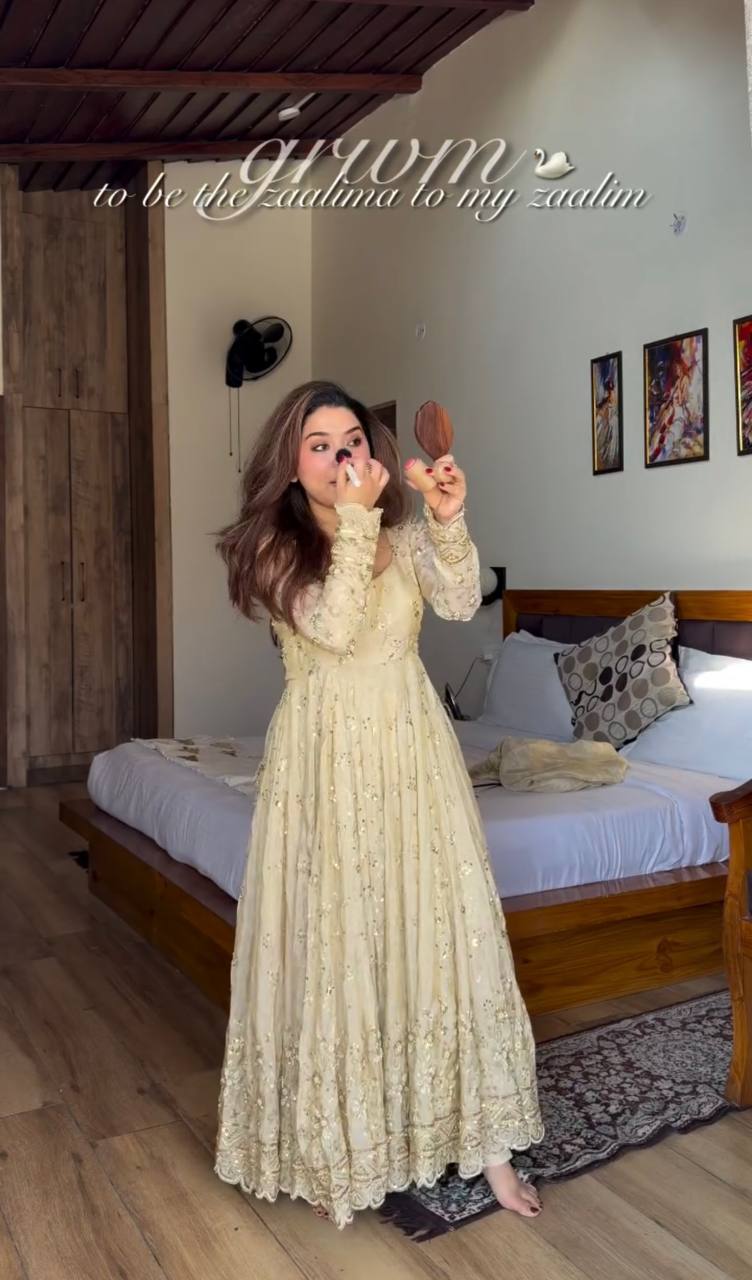 soft ivory designer gown with elegant flare