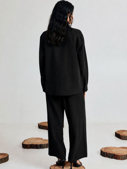 Sara Ali Khan black co-ord set for women — back view, wide-leg pant detail
