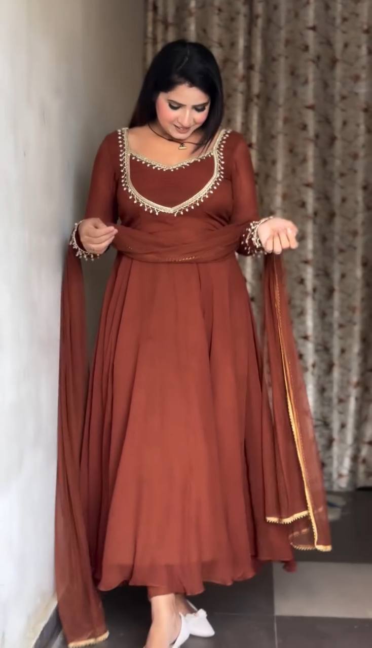 party wear brown anarkali set with golden border detailing