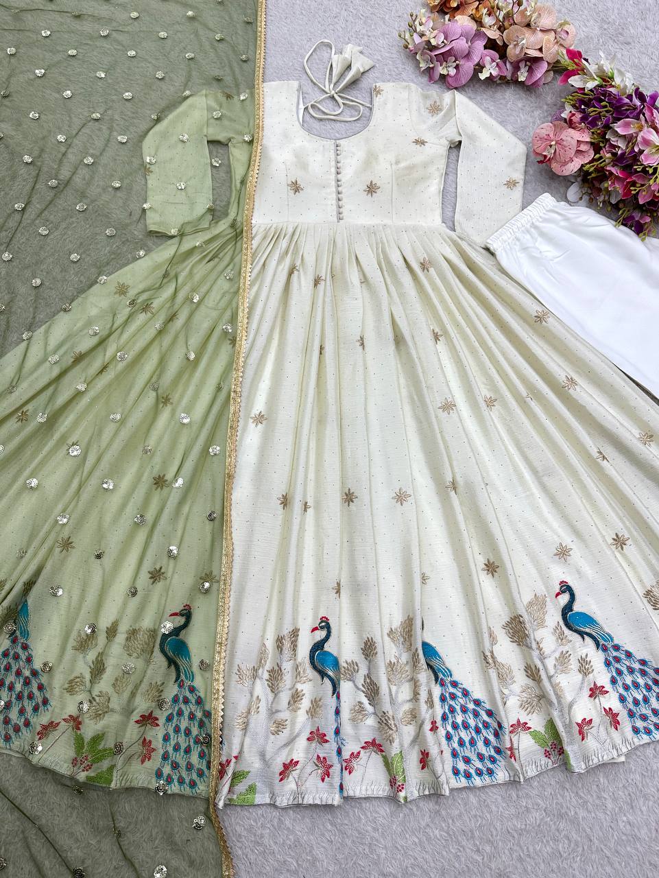 designer white anarkali dress with handcrafted peacock motifs
