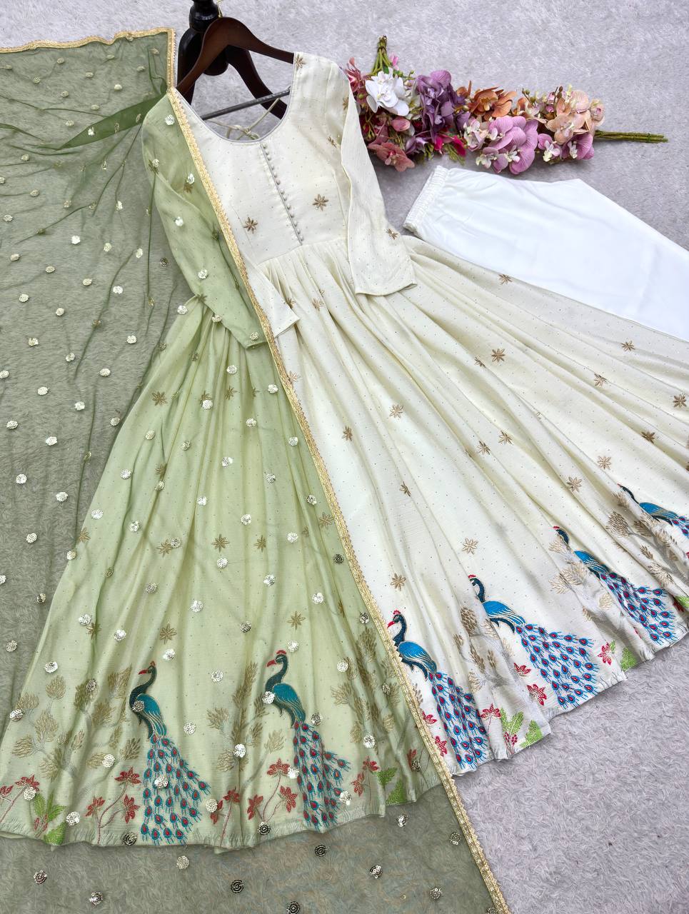 designer white anarkali dress with handcrafted peacock motifs