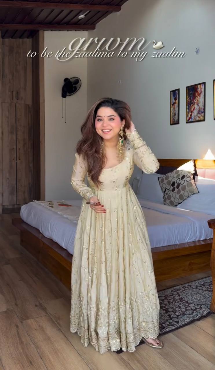 soft ivory designer gown with elegant flare