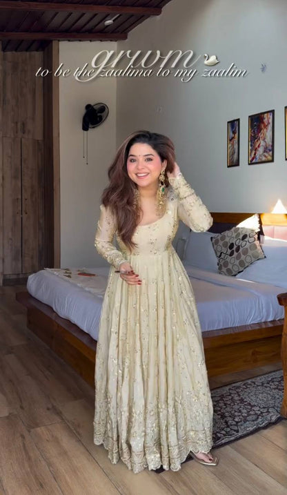 Soft Ivory Designer Gown with Elegant Flare
