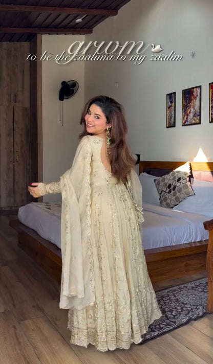 Soft Ivory Designer Gown with Elegant Flare