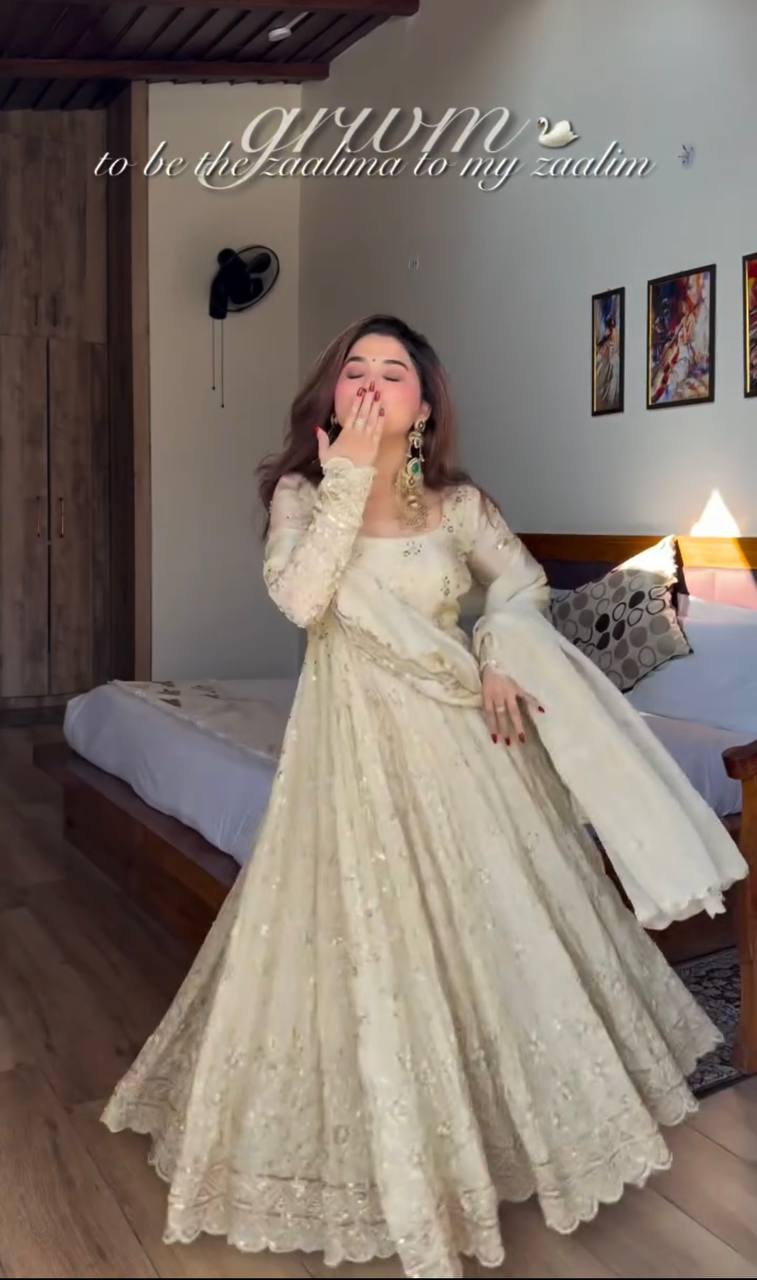 soft ivory designer gown with elegant flare