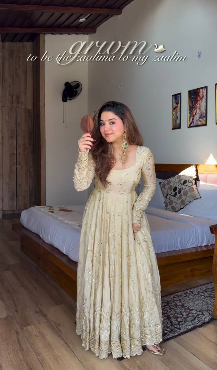 soft ivory designer gown with elegant flare