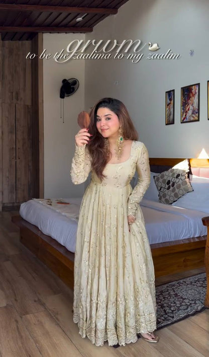 Soft Ivory Designer Gown with Elegant Flare