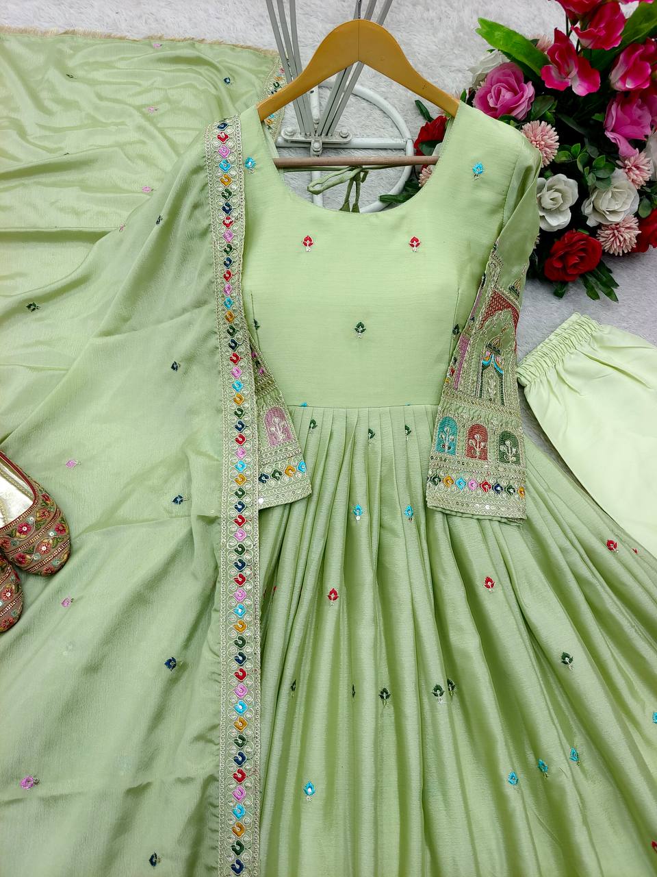 pastel green anarkali gown with intricate embroidery & dupatta