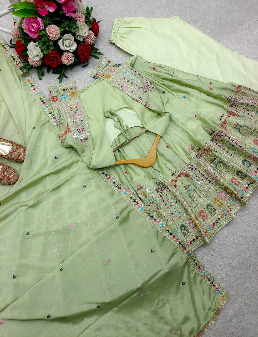 pastel green anarkali gown with intricate embroidery & dupatta